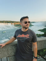 Signal Breaker Tee lifestyle photo at Niagara Falls, front view