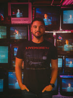 Watch Different Tee lifestyle photo in a retro video store TV wall